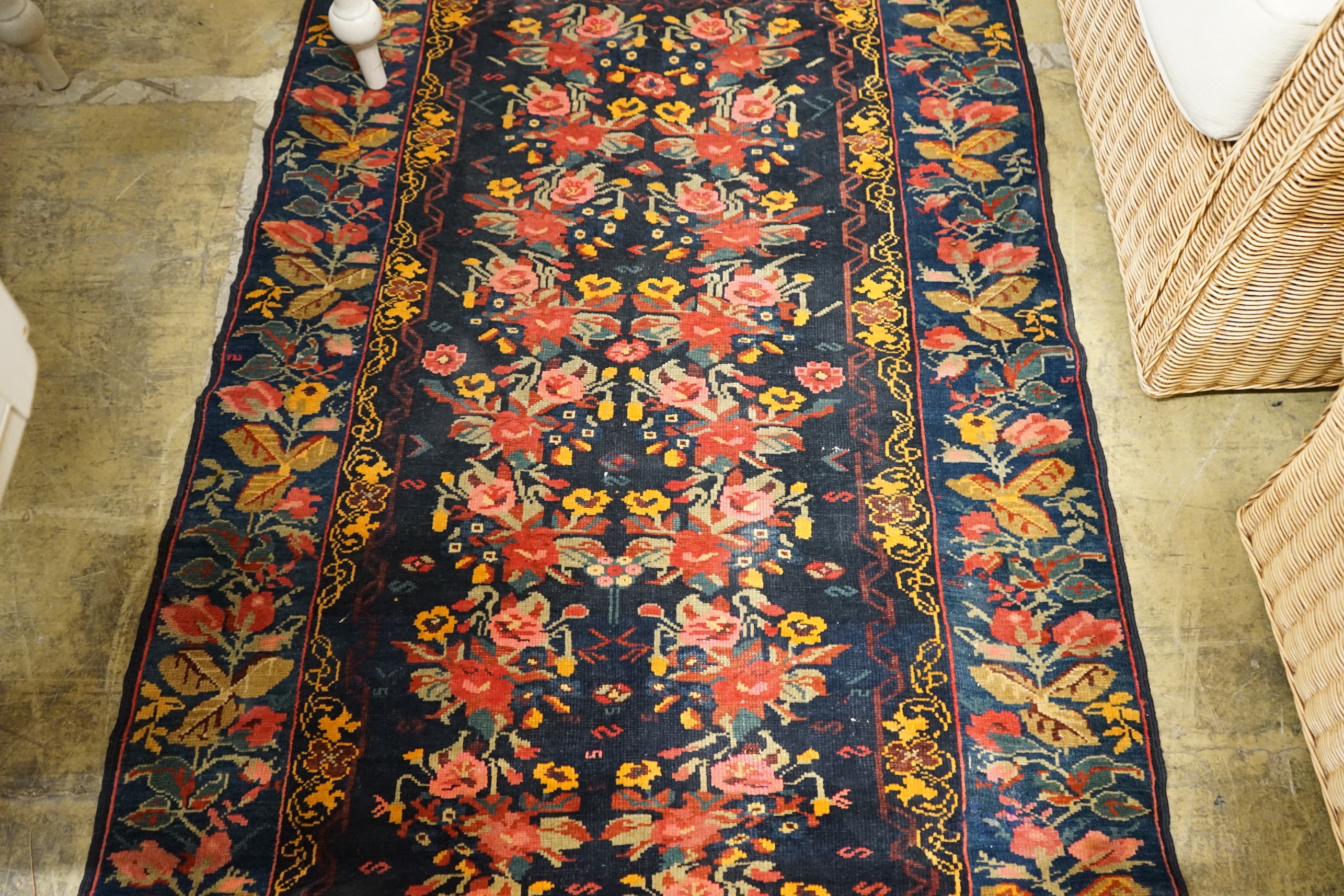 A Kirman style blue ground floral rug, 160 x 105cm